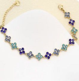 Bracelet trèfles pavés de zircons – éclat joaillier en acier inoxydable - bleu